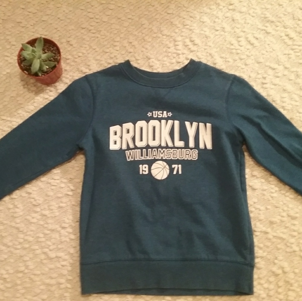 A cute cute blue varsity Brooklyn sweater.